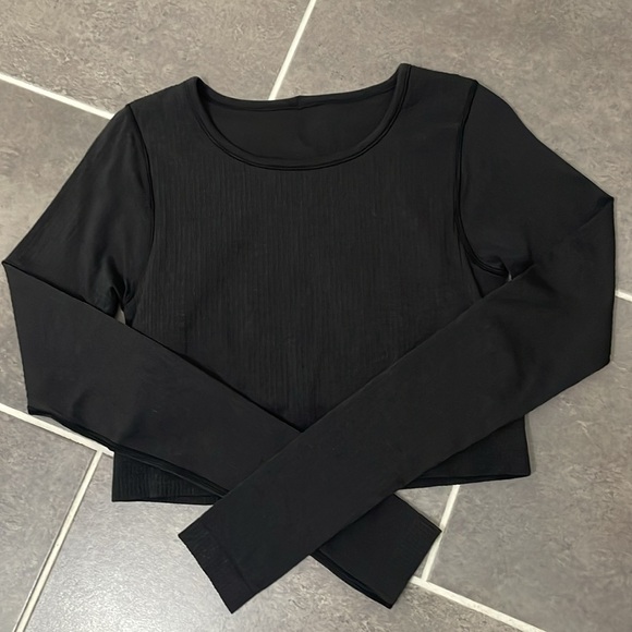 lululemon athletica Tops - Lululemon Ebb to Street Long Sleeve size 8
Black